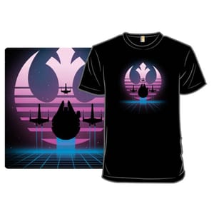 A black t-shirt features a retro-style design with a spacecraft silhouette and pink-purple circular graphics on a grid background, evoking a sci-fi theme.