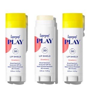 Supergoop! PLAY Lip Shield Strawberry SPF 30, offering broad-spectrum sun protection, water and sweat resistance for 80 minutes, in a stick format.