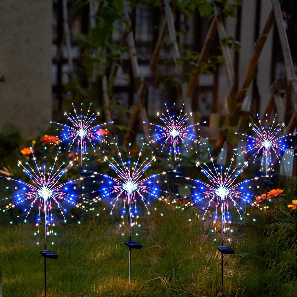 6pk Solar LED Firework Garden Lights feature multicolored LED spikes resembling fireworks, designed for outdoor garden decoration, each with a solar panel for power.