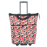 A geometric red, black, and white wheeled tote bag with a pull-out handle and front pocket.