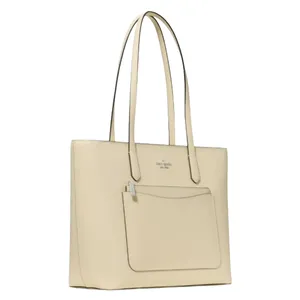 A beige tote bag with long handles, featuring an exterior pocket and a minimalist design.
