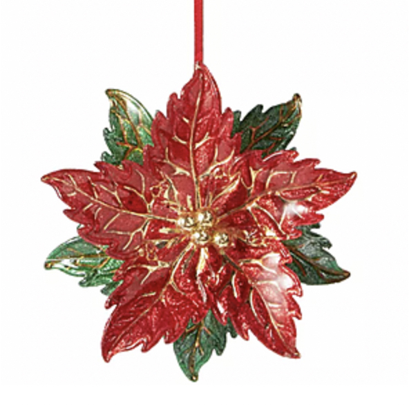 A vibrant red and green poinsettia ornament with gold accents, resembling a holiday flower decoration, suspended by a red ribbon.