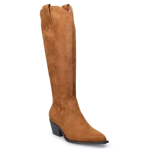 A brown suede knee-high boot with a pointed toe and a low stacked heel, featuring pull tabs on both sides.