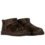 Brown leopard print ankle boots with a flat sole and rounded toes, featuring a cozy, slip-on design.