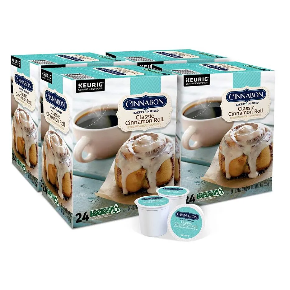 Boxes of Cinnabon Classic Cinnamon Roll Keurig coffee pods on a table.