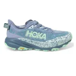 Hoka trail running shoe in lavender and mint green with a Vibram sole and a patterned midsole.