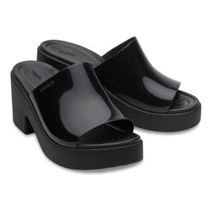 Black Crocs Brooklyn Slip-On Heels feature a sleek, open-toe design with a high block heel and a comfortable, glossy platform.