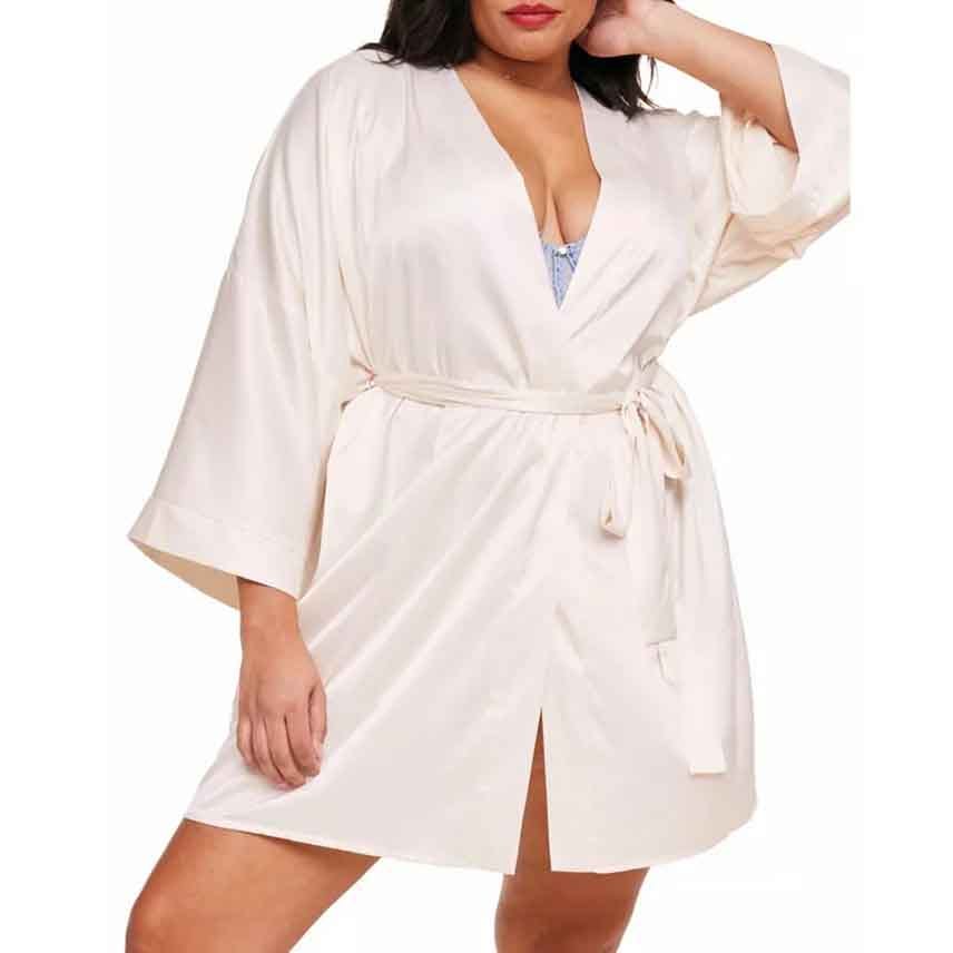 A plus-size robe in a light cream color with wide sleeves and a fabric tie belt, offering a relaxed fit and knee-length design.
