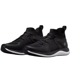A pair of black athletic sneakers with a white sole, featuring a knitted upper design and lace-up closure.