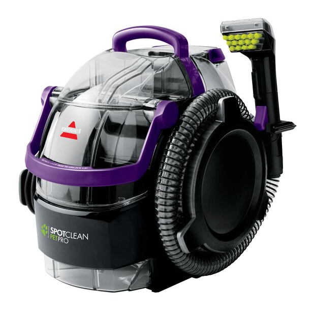 A Bissell SpotClean Pet Pro portable carpet cleaner with a black and purple design, featuring a clear water tank and a flexible hose.