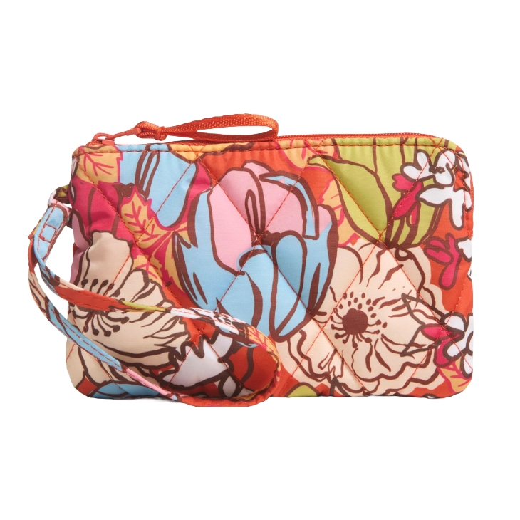 A colorful floral-patterned quilted wristlet with a zipper closure and attached strap.