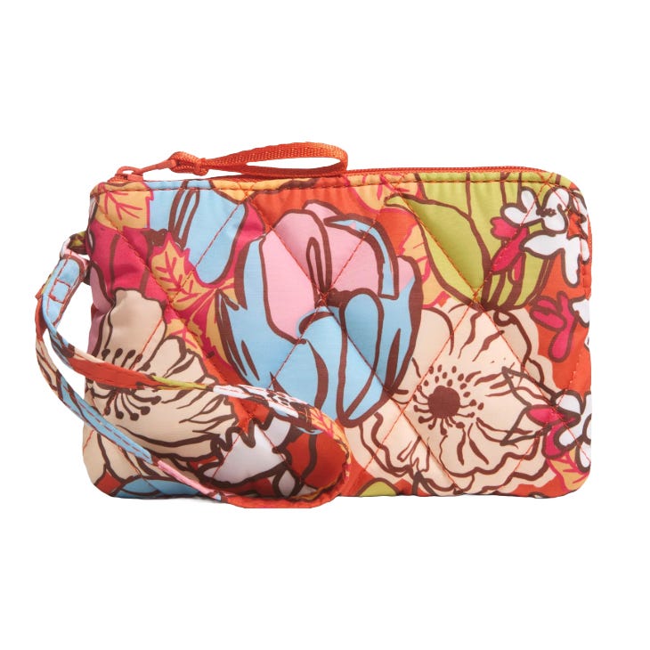 A colorful floral-patterned quilted wristlet with a zipper closure and attached strap.