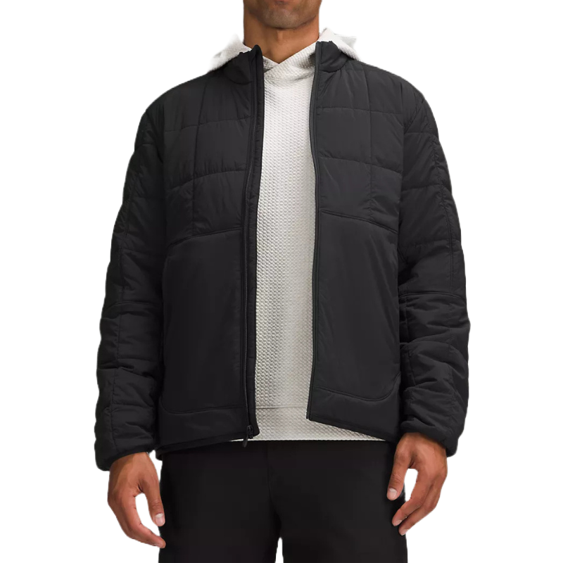 Lululemon Men's Insulated Jacket is a black, quilted design with long sleeves and a zipper closure. It's worn over a light-colored hoodie, offering a casual and sporty look.
