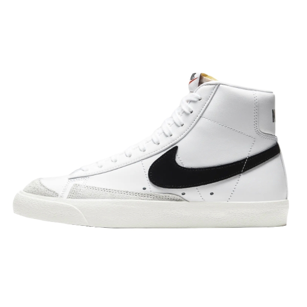White high-top sneakers with a black Nike swoosh, featuring a leather upper and suede detailing at the toe. They have a classic, retro design with a padded collar and a rubber sole.