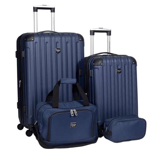 A four-piece navy luggage set including two hard-shell suitcases with telescopic handles, a duffel bag, and a toiletry bag.