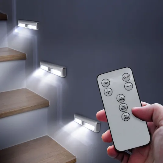Wall-mounted LED stair lights are shown, with a remote control featuring on/off and timer options for 10, 30, and 60 minutes.