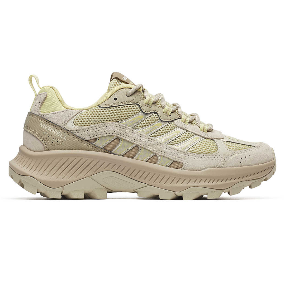Merrell hiking shoe in beige features a mesh and synthetic upper, with a robust sole designed for traction and comfort.