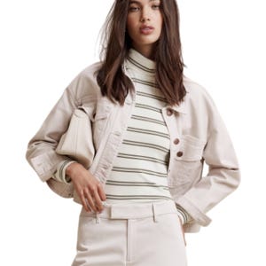 A fitted, long-sleeve turtleneck with a white base and thin, horizontal green and black stripes.