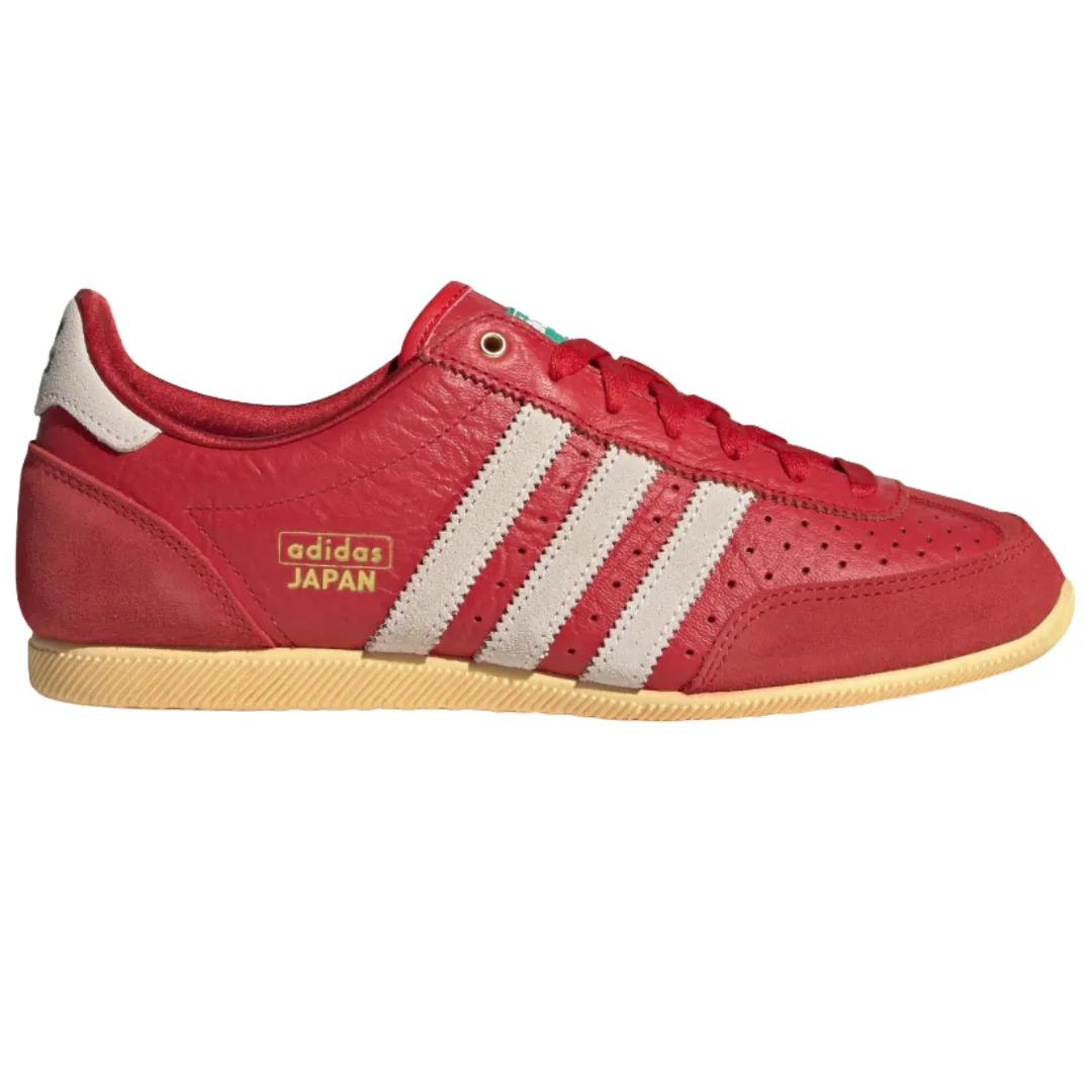 Red Adidas Japan sneaker featuring white stripes and a beige sole, with \“adidas JAPAN\“ branding on the side.