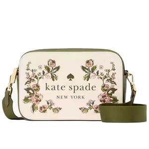 A Kate Spade New York shoulder bag with a floral design on a cream background, featuring an olive green strap and trim.