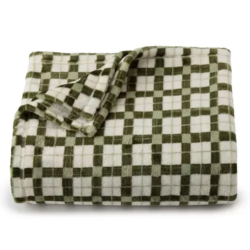 A folded, soft blanket with a green and white checkered pattern.