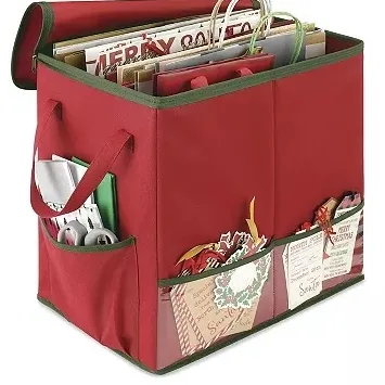 A red storage tote with green trim designed to organize and store holiday wrapping supplies, featuring internal compartments and exterior pockets for items like gift bags, scissors, and cards.