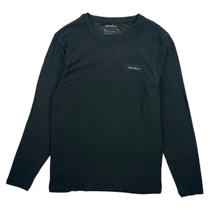 A black long-sleeve shirt with a small logo on the chest and a crew neck design.