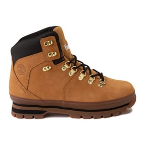 Tan-colored women's hiking boots with a black padded collar, metal eyelets for laces, and a brown rubber outsole. The Timberland logo is embossed on the side.