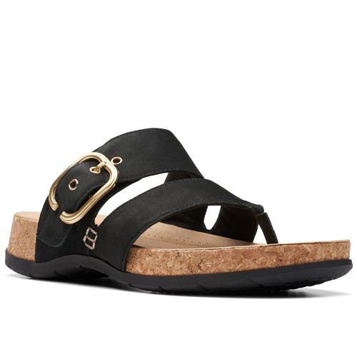 Clarks Reileigh Park Sandals feature a black leather design with a large gold buckle, cork midsole, and a comfortable footbed, all resting on a black rubber outsole.