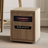 A wooden-cased infrared space heater with digital controls and a temperature display set at 76°F, placed on a carpeted floor.