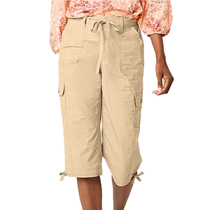Beige cargo capri pants featuring multiple pockets, a drawstring waist, and leg ties. The pants are paired with a floral patterned blouse.