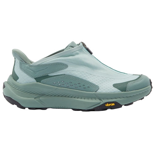 A light teal athletic shoe with a sleek, slip-on design and a Vibram sole for enhanced traction and performance.
