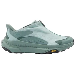 A light teal athletic shoe with a sleek, slip-on design and a Vibram sole for enhanced traction and performance.