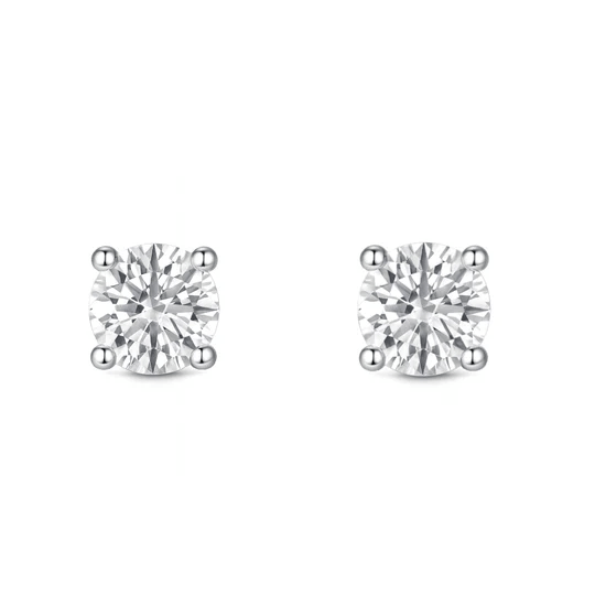 A pair of round diamond stud earrings in a four-prong setting.