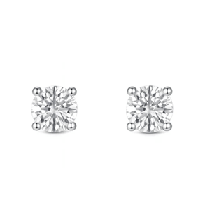A pair of round diamond stud earrings in a four-prong setting.