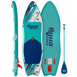 Aqua PRO Halcyon Adventure Paddleboard features vibrant turquoise and white colors with bungee storage, a textured grip pad, and comes with a matching paddle. Its design includes multiple fins and is labeled \“11 Adventure\“ on the side.