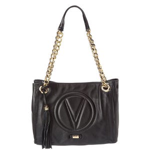 Black leather handbag with a prominent embossed Valentino logo, gold-tone chain strap, and a tassel detail.