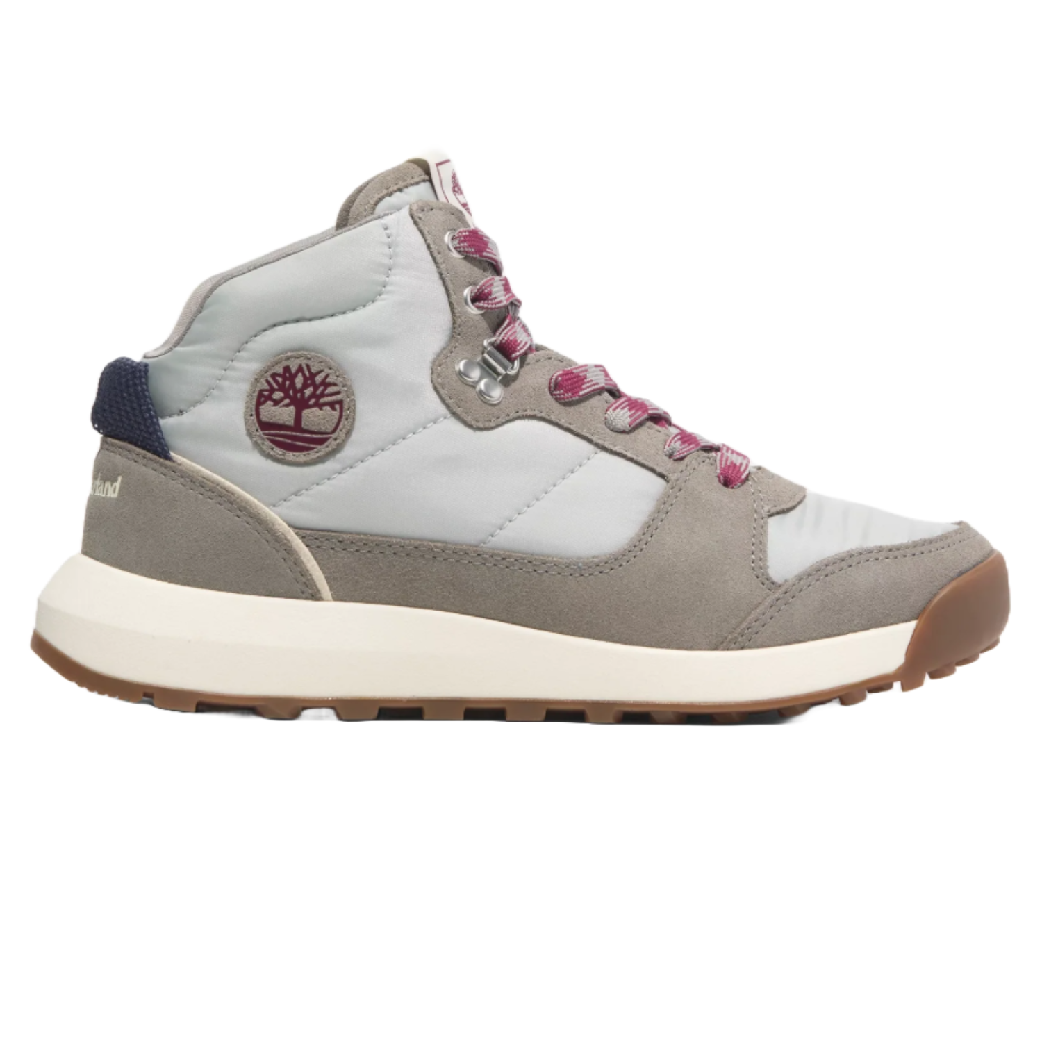 Timberland Retro Swift Sneakers feature a gray and light blue color scheme with pink laces, a suede and fabric blend, and a rubber sole. They sport the Timberland logo on the side and heel, and have a cushioned midsole for comfort.