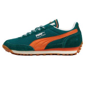 Puma Men's Easy Rider Shoes feature a retro design with teal suede and mesh upper, orange Puma stripe, white midsole, and gum rubber outsole for traction. The shoe is accentuated by the \“Easy Rider\“ text and classic branding.