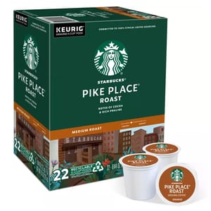 Starbucks Pike Place Roast medium roast coffee in K-Cup pods, featuring notes of cocoa and rich praline, with a package containing 22 recyclable pods for Keurig machines.