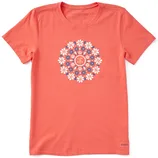 A coral-colored t-shirt features a circular floral design with the words \“Life is Good\“ in the center, surrounded by white and blue flowers.