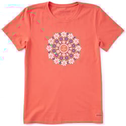 A coral-colored t-shirt features a circular floral design with the words \“Life is Good\“ in the center, surrounded by white and blue flowers.