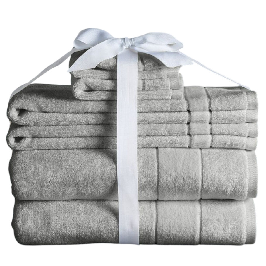 A stack of neatly folded gray towels tied with a white ribbon, including several sizes such as washcloths and larger bath towels.