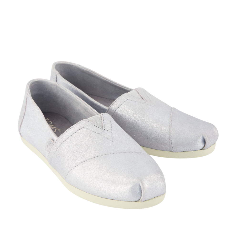 Pair of shiny, silver slip-on shoes with a classic, casual design featuring a V-shaped elastic inset and cushioned soles.