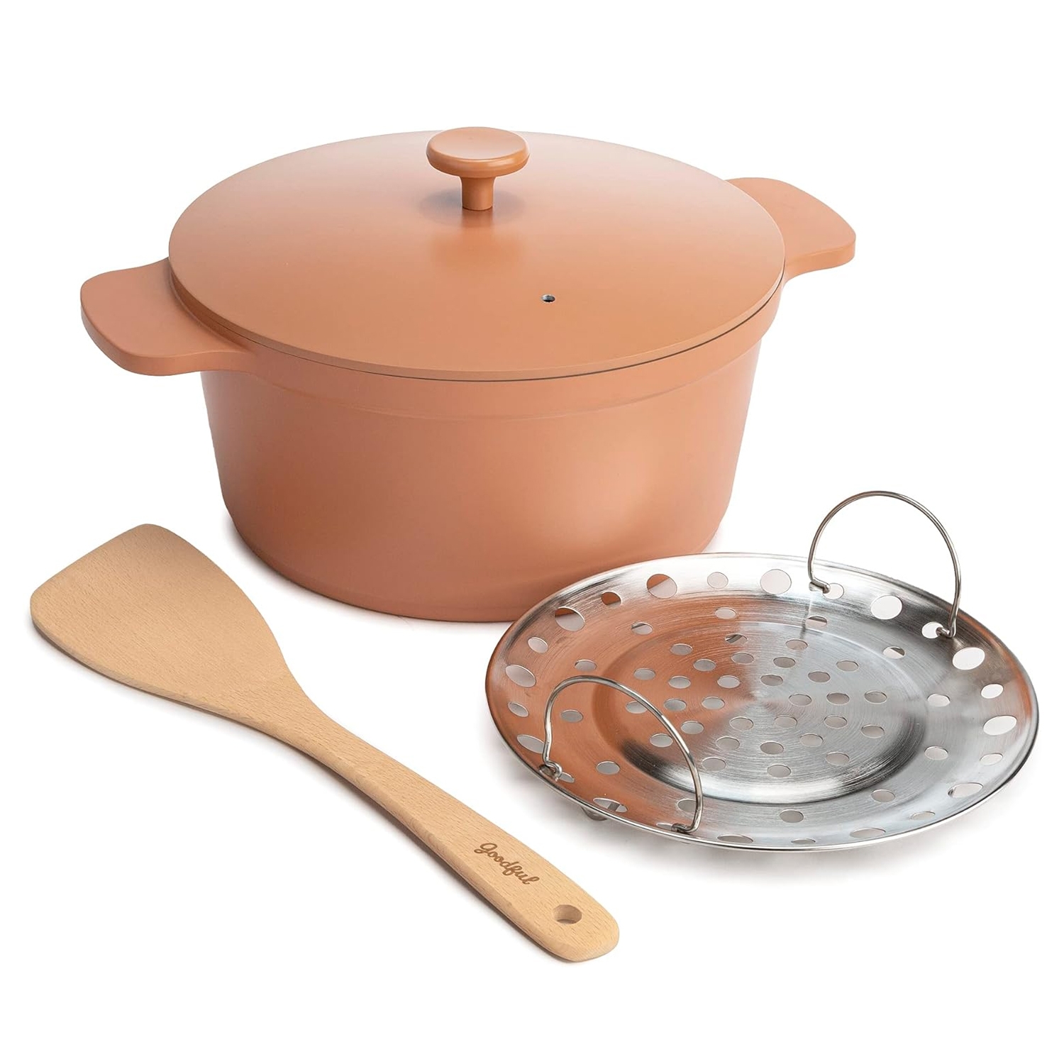 Goodful All-In-One Nonstick Pot in terracotta includes a lid, a wooden spatula, and a stainless-steel steamer insert.