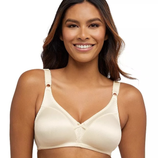 A woman is wearing a beige bra with wide straps and a subtle design, featuring a small bow at the front. The bra appears to be wireless and designed for comfort.