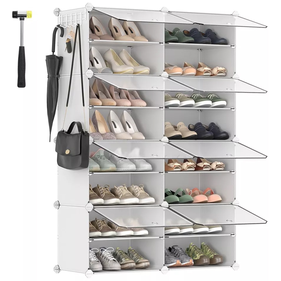 White 8-cube organizer with transparent doors holds various shoes, featuring side hooks for hanging items like umbrellas and bags. Included is a small mallet for assembling or securing the unit.