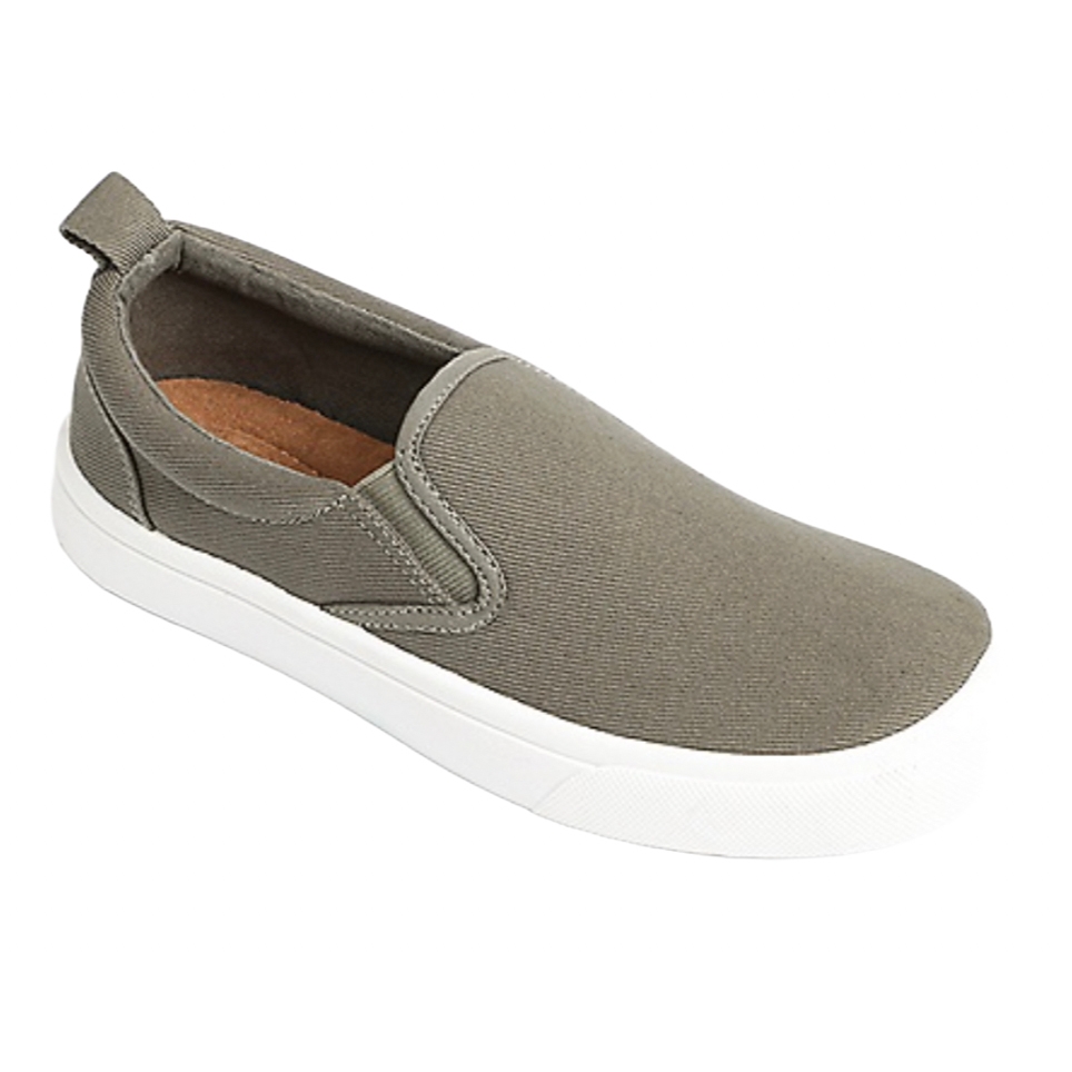 Women's slip-on sneakers with an olive green canvas upper and white rubber sole. Features a pull tab at the heel and elastic side panels for easy wear.