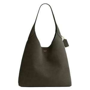 A dark green Coach leather hobo handbag featuring a minimalist design, gold-tone branding, and a matching leather tag with a gold attachment.