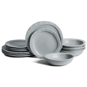 A set of gray melamine dinnerware includes plates and bowls, featuring a minimalist design.